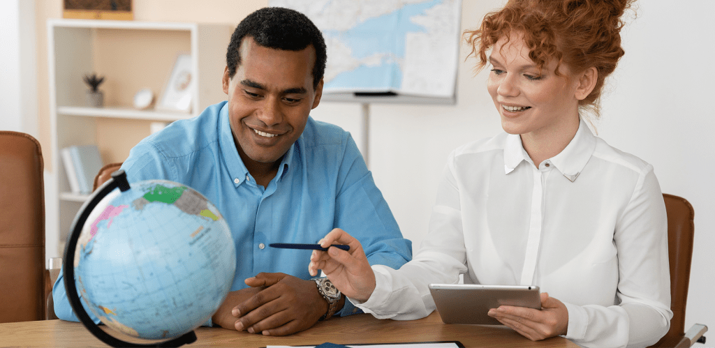 A professional discussing international family matters with a globe